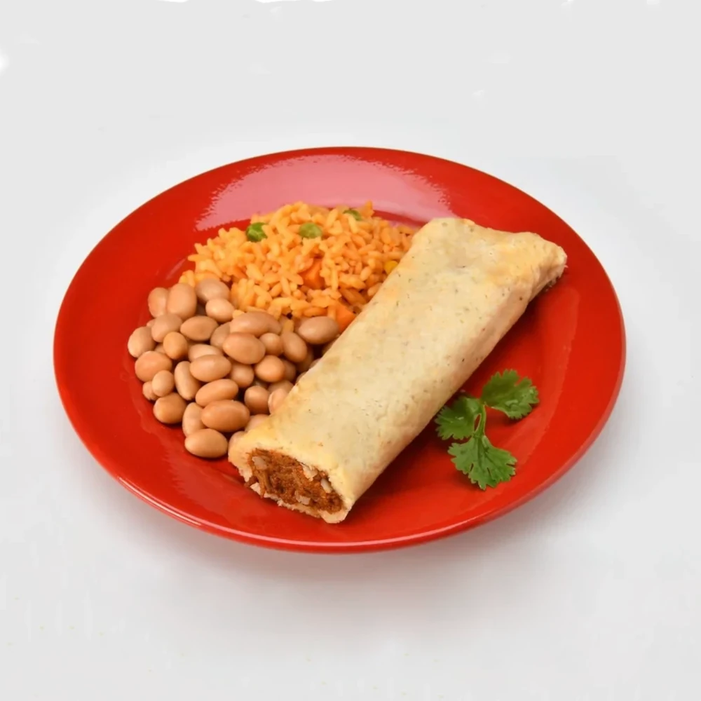 Pork Salsa Roja Tamale Wrapped in a Corn Husk Image